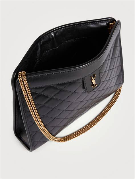 ysl black and gold clutch|ysl monogram quilted clutch.